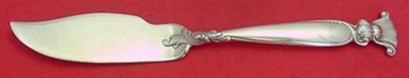 Wallace Romance of the Sea Sterling Silver Master Butter Knife 7 1/4": Wallace Romance of the Sea Sterling Silver Master Butter Knife 7 1/4" This exquisite 7 1/4" Master Butter Knife features a flat handle crafted from high-quality sterling silver, showcasing the elegant