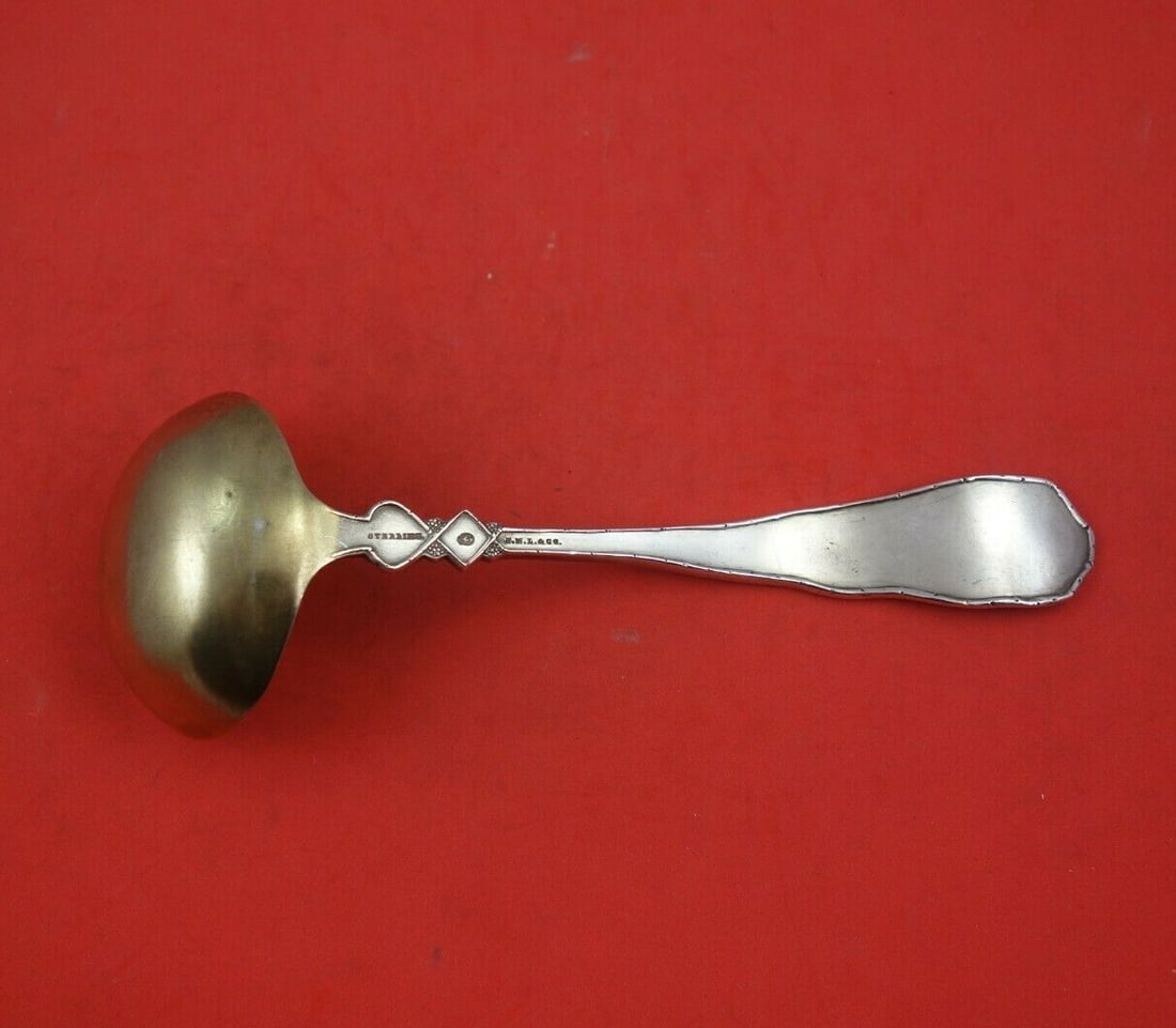 Durgin Bouquet Sterling Silver Gravy Ladle Gold Washed 7 3/4 Inches: Durgin Bouquet Sterling Silver Gravy Ladle Gold Washed 7 3/4 Inches This exquisite gravy ladle from the renowned Durgin brand features a stunning Bouquet pattern, crafted from high-quality sterling si