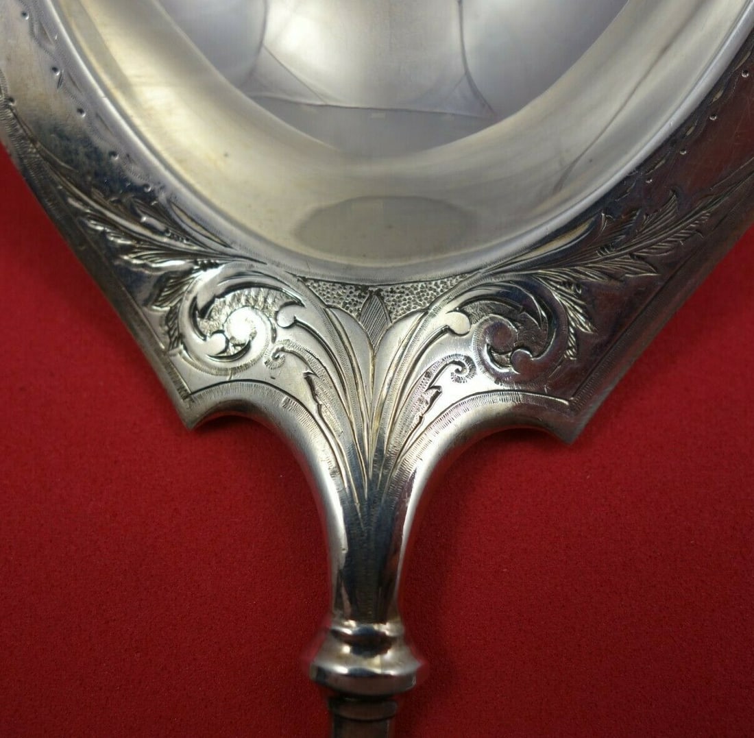 Gorham Ivy Sterling Silver Ice Cream Serving Spoon 9 7/8" Antique: Gorham Ivy Sterling Silver Ice Cream Serving Spoon 9 7/8" Antique This exquisite ice cream serving spoon, part of the Ivy pattern by Gorham, showcases the elegance of sterling silver craftsmanship. Me