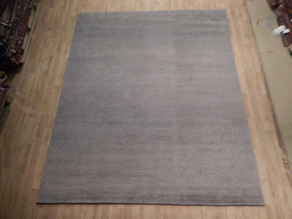 8.2 x 9.9 Modern Wool Blend Rug Handmade in India Earth Tone: 8.2 x 9.9 Modern Wool Blend Rug Handmade in India Earth Tone Free continental US Shipping Transform your space with this stunning 8.2 x 9.9 feet Taupe Earth Tone Wool Blend Modern Rug, meticulously ha