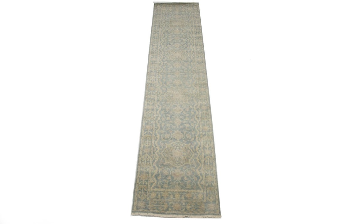 2'7 x 14'2 Wool Floral Transitional Runner Rug Handmade in India: 2'7 x 14'2 Wool Floral Transitional Runner Rug Handmade in India This handmade runner rug features a transitional floral pattern in muted tones of teal, cream, beige, and more. Crafted in India using