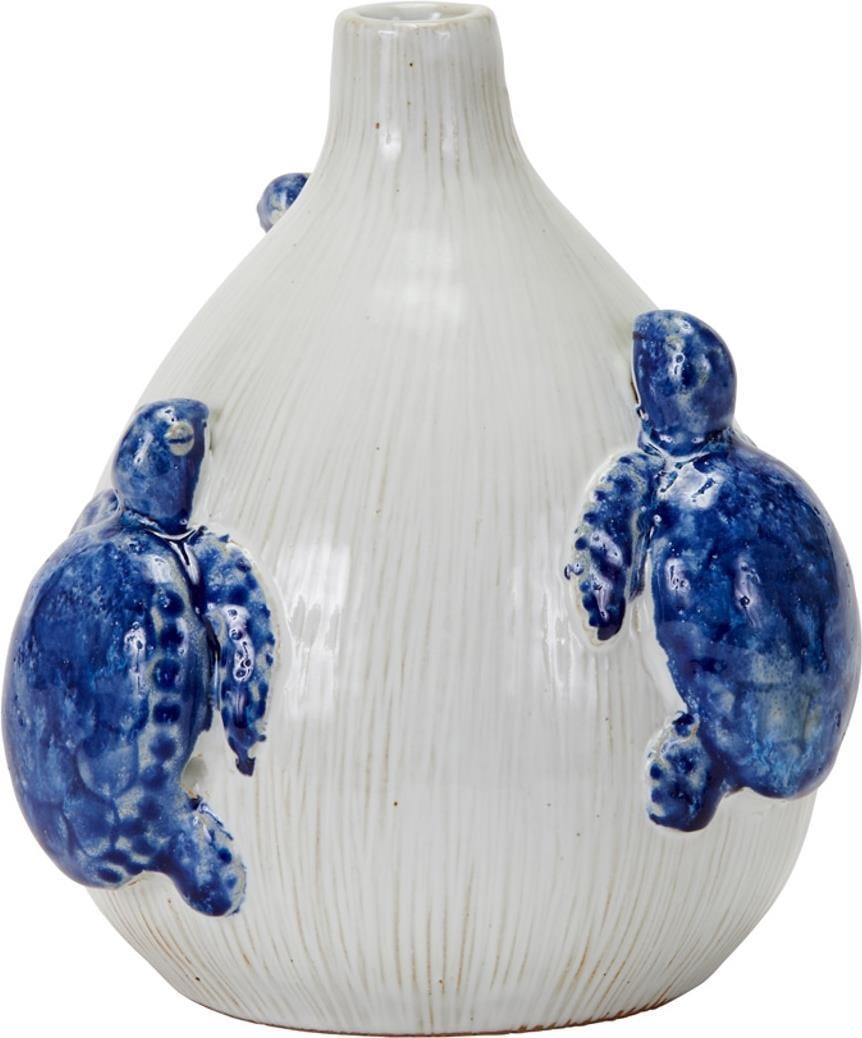 Handmade Blue Turtle Vase 6.5H 7.5W 7.5D Unique Decor: Handmade Blue Turtle Vase 6.5H 7.5W 7.5D Unique Decor This exquisite handmade blue turtle vase is perfect for adding a unique touch to your interior decor. With its charming turtle design, it serves a