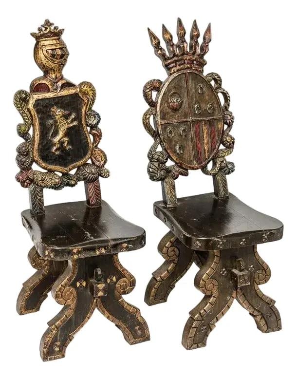 Antique Pair of Spanish Hall Chairs with Armorial Crests 19th Century: Antique Pair of Spanish Hall Chairs with Armorial Crests 19th Century This exquisite pair of late 19th century Spanish Hall Chairs showcases stunning craftsmanship with hand-carved details and distinc