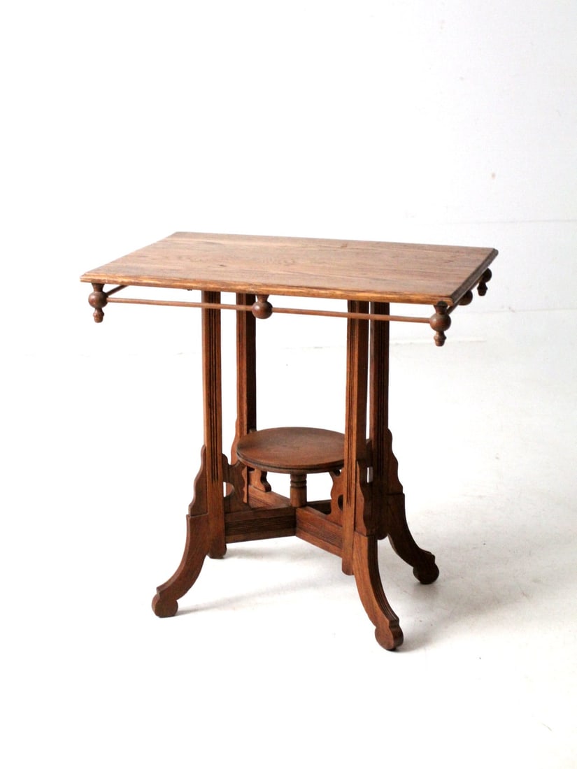 Antique Victorian Eastlake Side Table with Stick and Ball Design: Antique Victorian Eastlake Side Table with Stick and Ball Design This exquisite antique Victorian Eastlake-style side table showcases timeless charm, featuring intricate stick and ball detailing on th