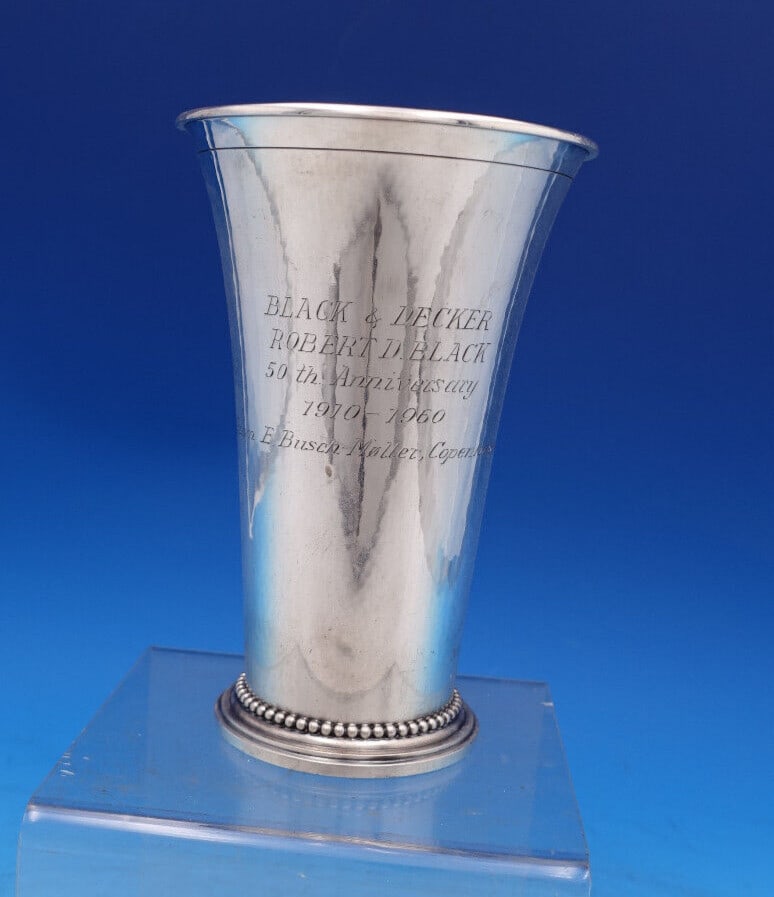 Georg Jensen Beaded Sterling Silver Vase 50th Anniversary Inscription: Georg Jensen Beaded Sterling Silver Vase 50th Anniversary Inscription This exquisite Beaded Vase by Georg Jensen is crafted from high-quality sterling silver, showcasing a timeless design. It features