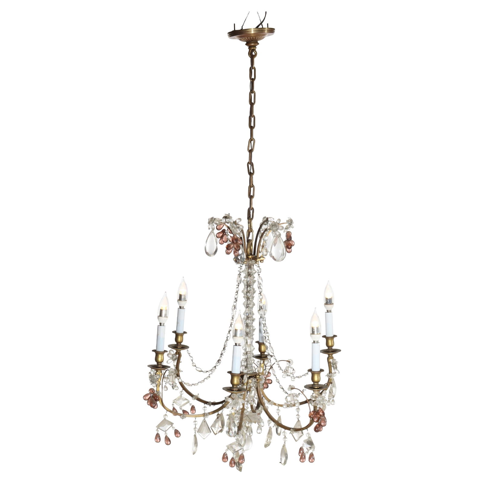 Six Arm Brass and Crystal Chandelier in French Louis XIV Style Circa 1930: Six Arm Brass and Crystal Chandelier in French Louis XIV Style Circa 1930 This antique chandelier, dating to circa 1930, is crafted in the French Louis XIV style. It features a brass frame with six ar