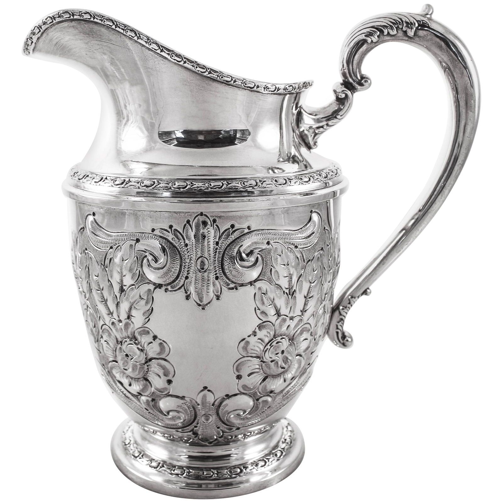 Frank Whiting Sterling Silver Water Pitcher Talisman Rose 1948: Frank Whiting Sterling Silver Water Pitcher Talisman Rose 1948 This exquisite sterling silver water pitcher showcases the Talisman Rose pattern, crafted by Frank Whiting in 1948. The pitcher features