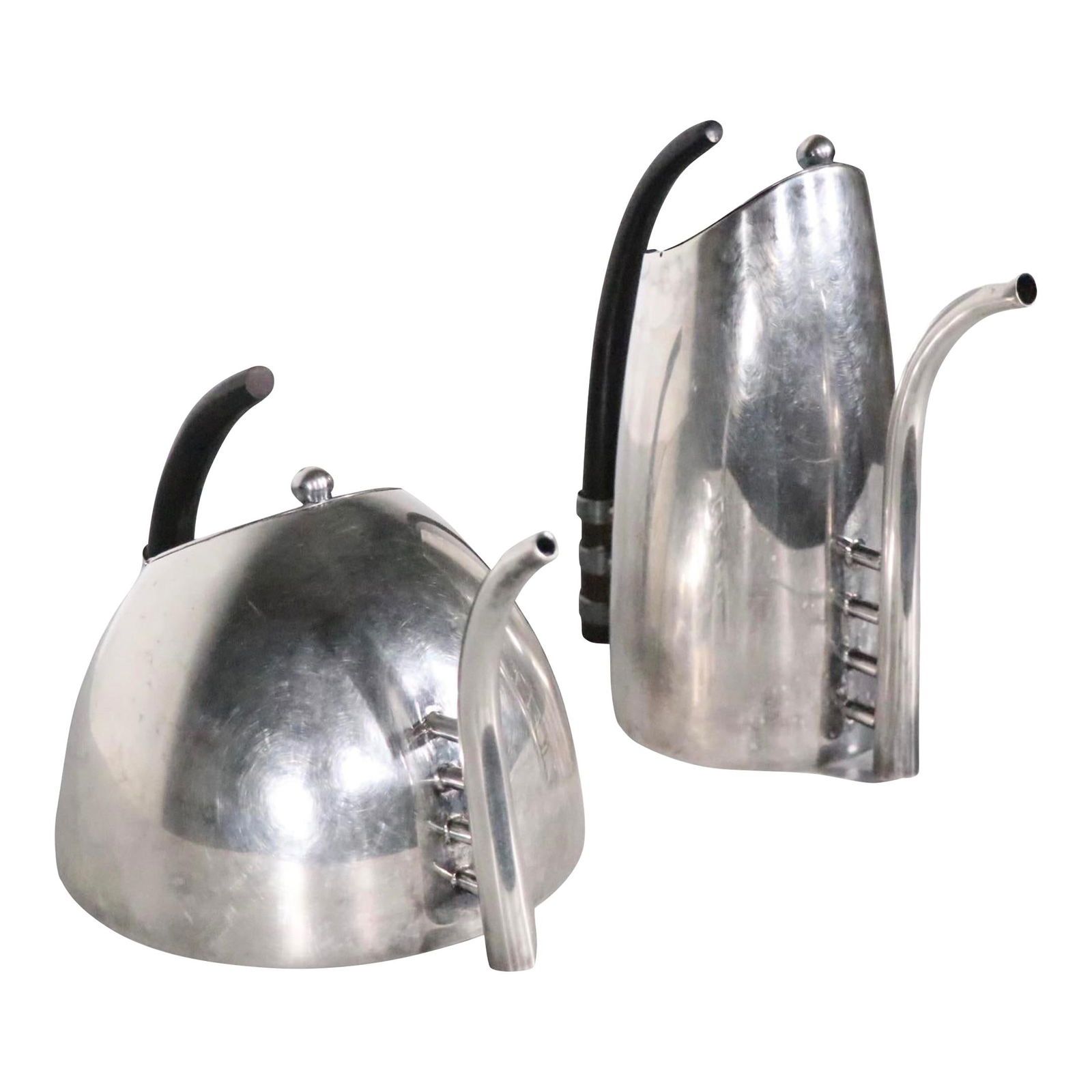 Lino Sabittini 2 Pc Silver-Plate Coffee and Tea Pot Set Italy 1980s: Lino Sabittini 2 Pc Silver-Plate Coffee and Tea Pot Set Italy 1980s Elevate your serving experience with this chic, postmodern silver-plate coffee and tea pot set, crafted by renowned Italian silversm