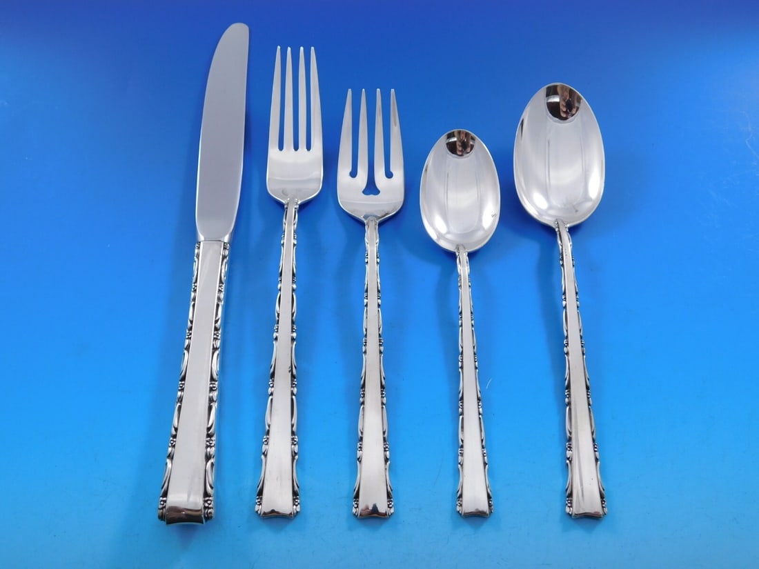 Lunt Madrigal Sterling Silver Flatware Set for 12 68 Pieces with Storage Chest: Lunt Madrigal Sterling Silver Flatware Set for 12 68 Pieces with Storage Chest Enhance your dining experience with the Madrigal Sterling Silver Flatware Set by Lunt, designed to serve 12. This exquisi