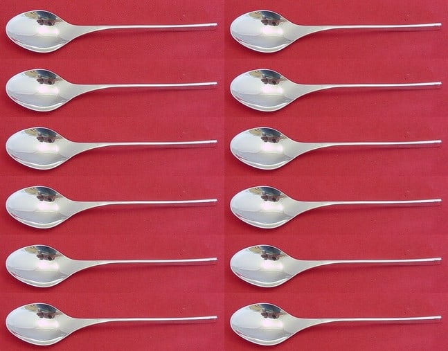 International Sterling Silver Vision Teaspoon Set of 12 Modern 6.25": International Sterling Silver Vision Teaspoon Set of 12 Modern 6.25" This exquisite set of 12 teaspoons features the Vision pattern by International, crafted from high-quality sterling silver. Each te