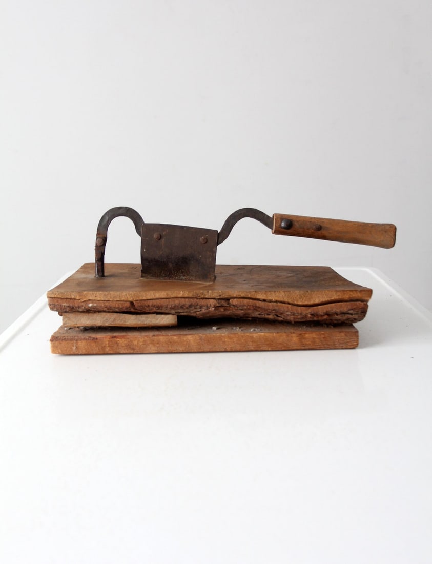 Antique Tobacco Cutter Tool Americana 17.5in Width: Antique Tobacco Cutter Tool Americana 17.5in Width This antique tobacco cutter tool showcases a worn wooden surface and a sturdy blade, reflecting the charm and functionality of a bygone era. A remark