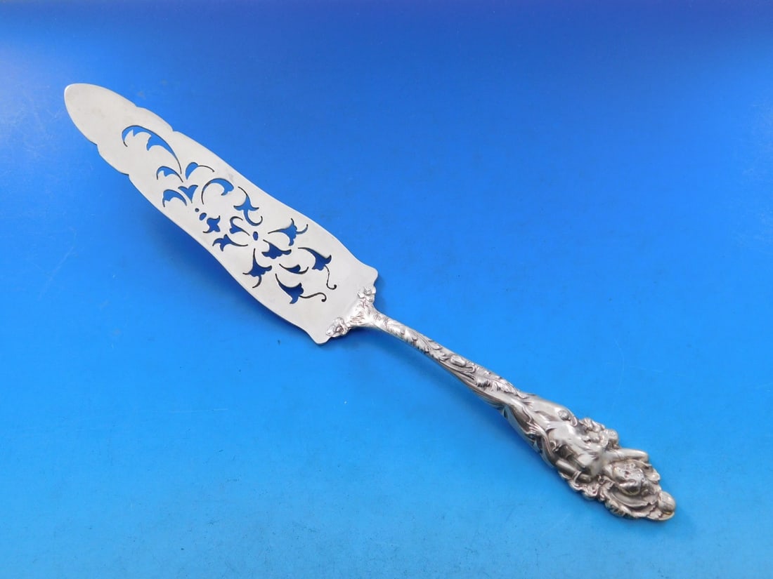 Reed and Barton Love Disarmed Sterling Silver Pierced Cake Server 10": Reed and Barton Love Disarmed Sterling Silver Pierced Cake Server 10" Introducing the exquisite Reed and Barton Sterling Silver Jelly Cake Server, crafted in the elegant Love Disarmed pattern. This pi