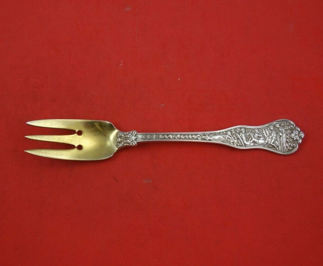 Tiffany & Co Olympian Gold Washed Sterling Silver Salad Fork 3-Tine 6 3/4": Tiffany & Co Olympian Gold Washed Sterling Silver Salad Fork 3-Tine 6 3/4" This exquisite salad fork is part of the Olympian pattern by Tiffany & Co., crafted from fine sterling silver. Featuring a go