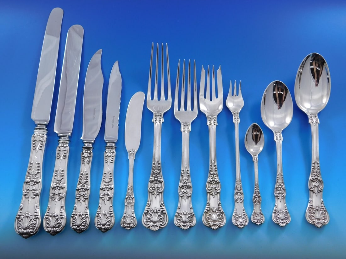 Tiffany & Co English King Sterling Silver Flatware Set 100 pcs with Storage Chest: Tiffany & Co English King Sterling Silver Flatware Set 100 pcs with Storage Chest Enhance your dining experience with this exquisite English King Sterling Silver Flatware Set by Tiffany & Co. This 100
