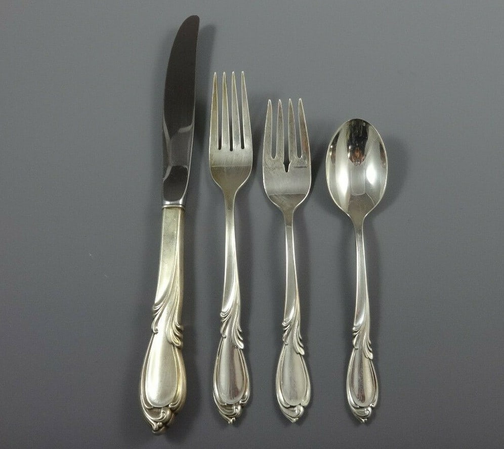 Rhapsody Pattern International Sterling Silver Flatware Set 33 Pieces Service for 8: Rhapsody Pattern International Sterling Silver Flatware Set 33 Pieces Service for 8 Discover the elegance of the Rhapsody pattern by International Sterling. This exquisite sterling silver flatware set