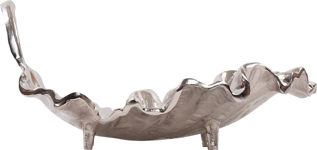 Contemporary Calathea Leaf Sculpture in Polished Silver by Howard Elliott: Contemporary Calathea Leaf Sculpture in Polished Silver by Howard Elliott Introducing an exquisite polished silver leaf sculpture that embodies contemporary style. This unique piece, crafted from alum