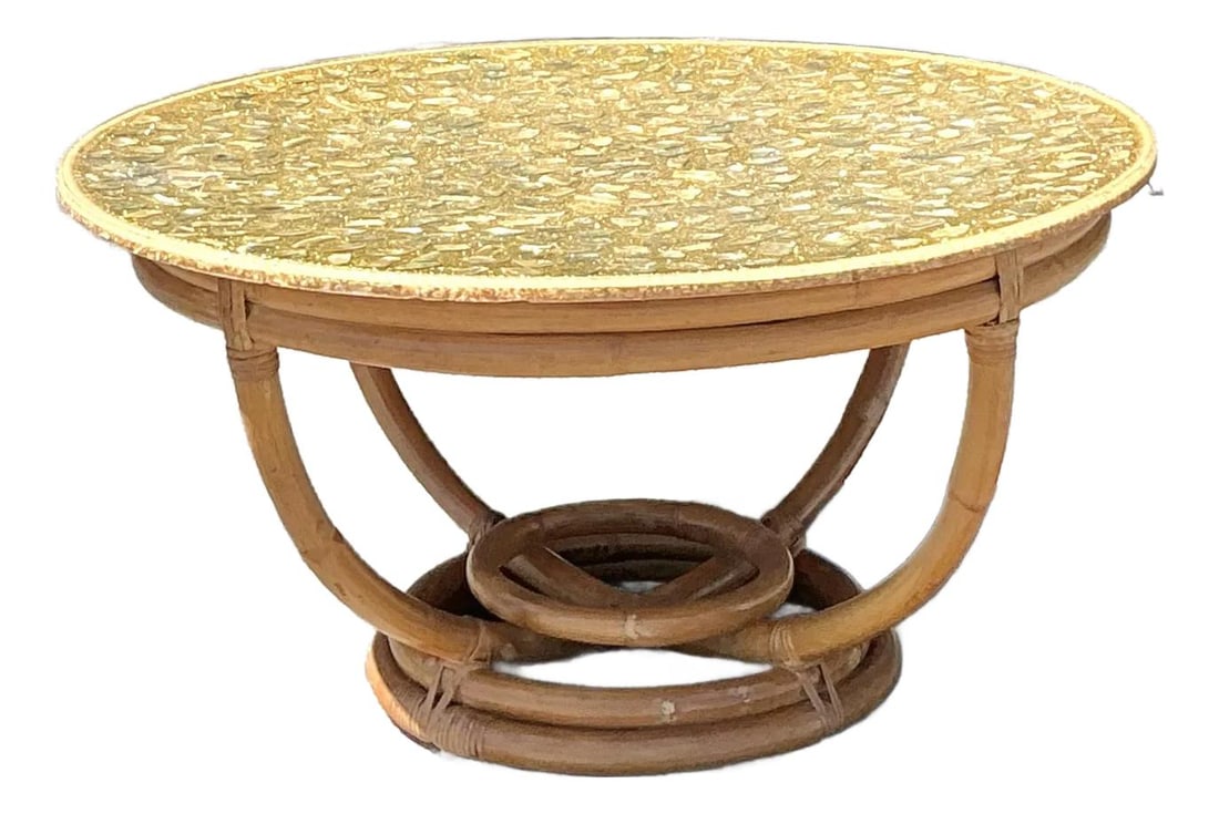 Vintage Coastal Coffee Table with Shells and Rattan Base 35.75" Round: Vintage Coastal Coffee Table with Shells and Rattan Base 35.75" Round Add a slice of coastal charm to your home with this vintage coffee table. The tabletop showcases a stunning array of natural seash