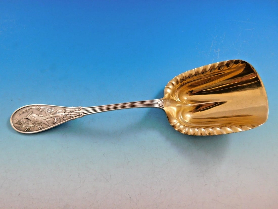 Tiffany & Co Japanese Sterling Silver Cracker Scoop Gold-Washed 9.5": Tiffany & Co Japanese Sterling Silver Cracker Scoop Gold-Washed 9.5" Experience the elegance of the Japanese by Tiffany & Co. Sterling Silver Cracker Scoop, a stunning serving piece measuring 9 1/2".