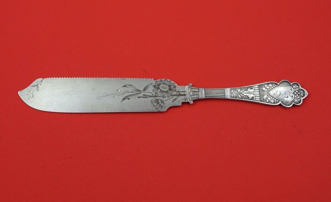 Gorham Maryland Sterling Silver Cake Saw 9 3/8 Brite-Cut Flowers: Gorham Maryland Sterling Silver Cake Saw 9 3/8 Brite-Cut Flowers This exquisite cake saw, crafted by Gorham, features the elegant Maryland pattern and is made entirely of sterling silver. Measuring 9