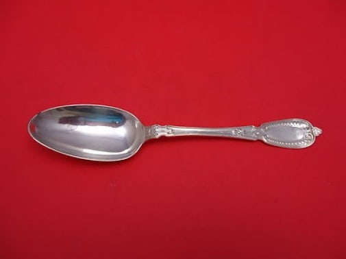 John Polhamus Armor Sterling Silver Serving Spoon 8 3/4": John Polhamus Armor Sterling Silver Serving Spoon 8 3/4" This exquisite serving spoon is part of the Armor pattern by John Polhamus, crafted from high-quality sterling silver. Measuring 8 3/4" in leng