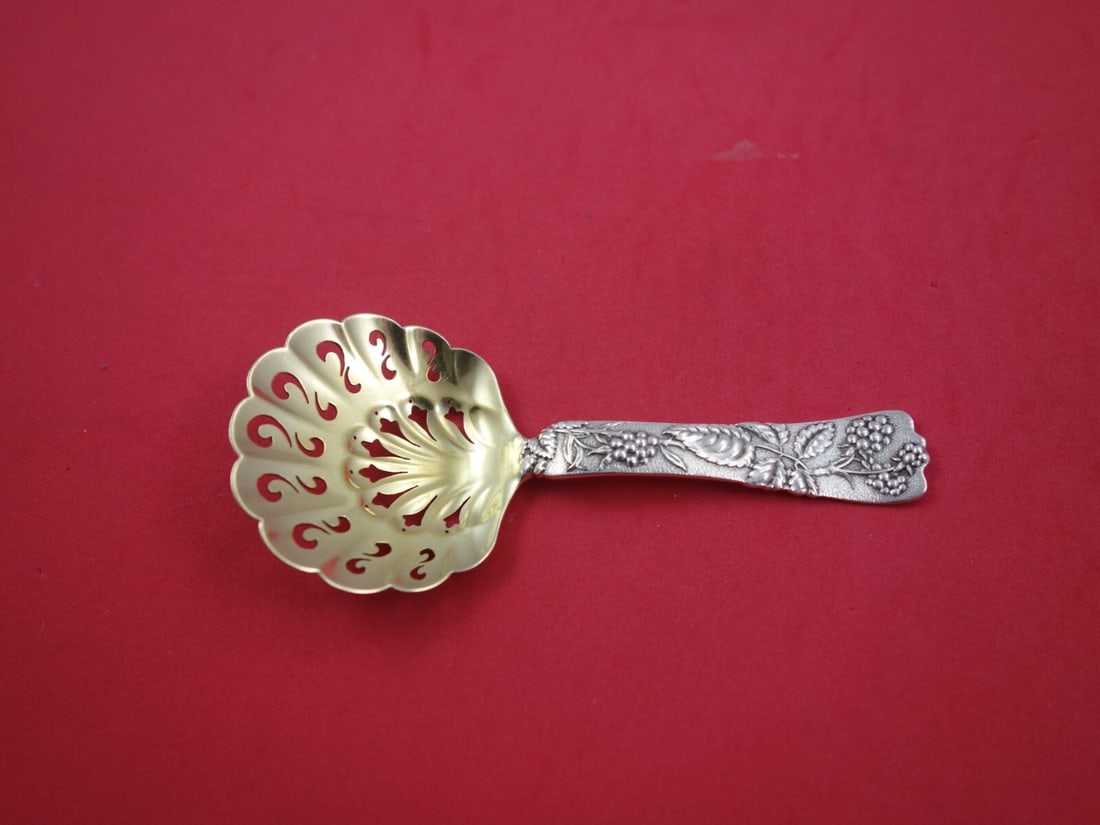 Tiffany & Co. Vine Sterling Silver Bon Bon Spoon with Raspberry Motif: Tiffany & Co. Vine Sterling Silver Bon Bon Spoon with Raspberry Motif This exquisite Bon Bon Spoon from the Vine pattern by Tiffany & Co. showcases the artistry of sterling silver craftsmanship. Featu