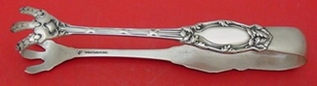 International Sterling Silver Abbottsford Sugar Tong 4 3/4": International Sterling Silver Abbottsford Sugar Tong 4 3/4" Presenting the Abbottsford sterling silver sugar tong, measuring 4 3/4". This exquisite piece features the classic Abbottsford pattern by In
