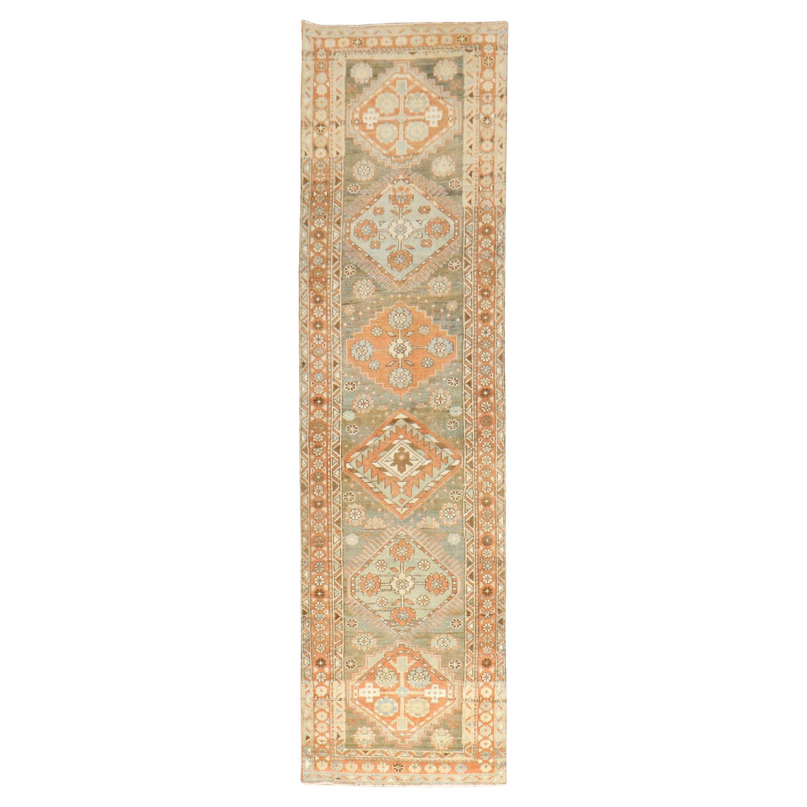 Narrow Persian Heriz Wool Tribal Runner Rug Circa 1930: Narrow Persian Heriz Wool Tribal Runner Rug Circa 1930 This is a narrow antique Persian Heriz runner from the early 20th century. Hand-woven in a tribal style, it is crafted from wool and originates f