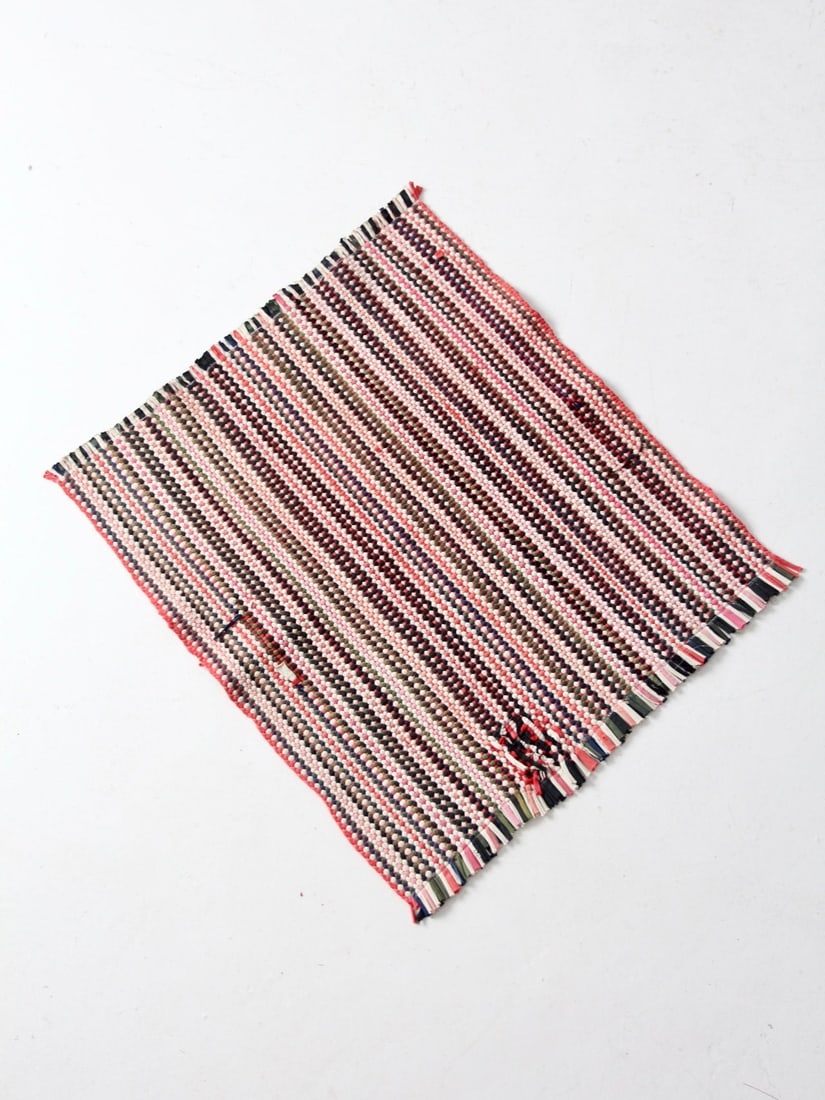 Muted Multicolor Striped Hand Loomed Rag Rug 33 x 27.5 Inch Vintage Textile: Muted Multicolor Striped Hand Loomed Rag Rug 33 x 27.5 Inch Vintage Textile This vintage hand loomed rag rug showcases a tightly woven striped pattern in muted multicolor tones. Its simple constructio