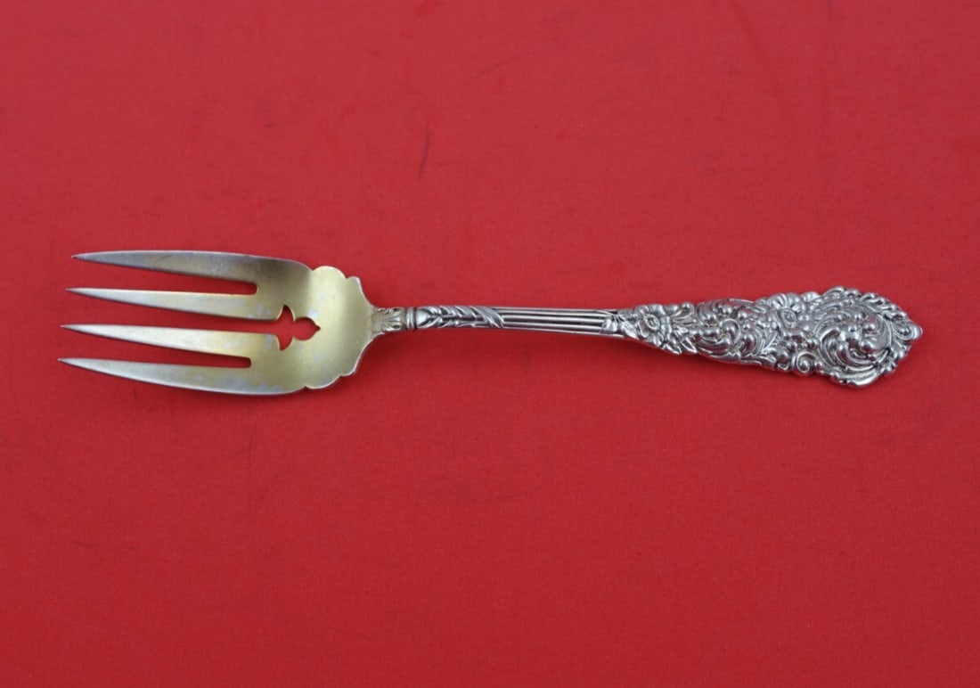 Reed and Barton Trajan Sterling Silver Salad Fork Light Gold Wash 6 1/8": Reed and Barton Trajan Sterling Silver Salad Fork Light Gold Wash 6 1/8" This exquisite salad fork from the Trajan pattern by Reed and Barton is crafted from sterling silver and features a light gold