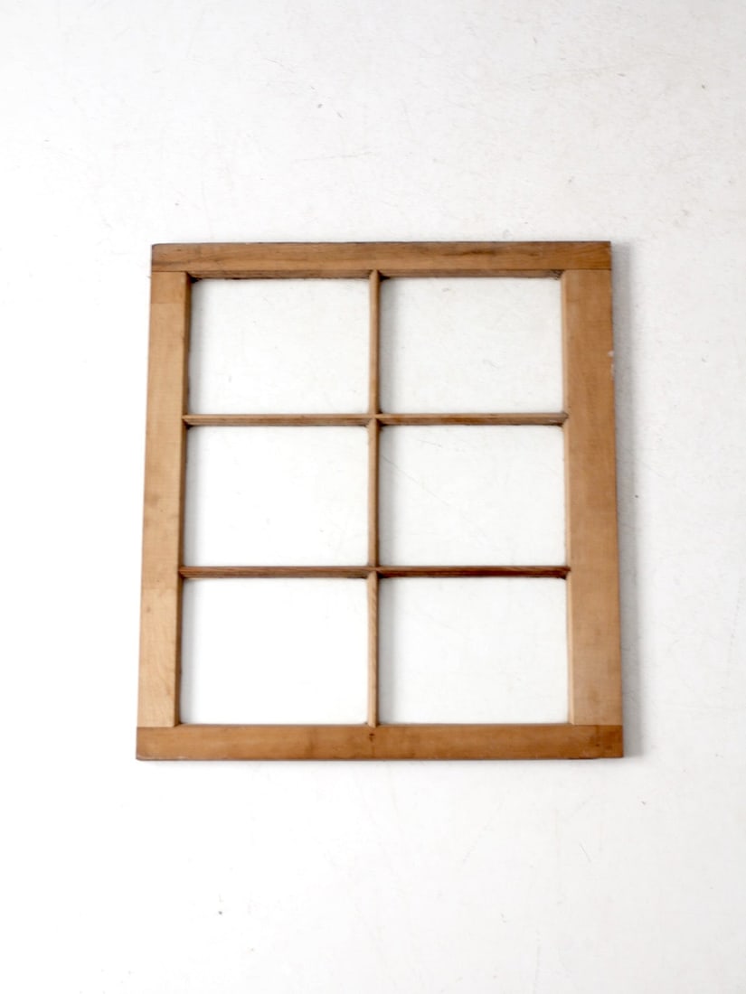Vintage Wooden Six-Pane Window Frame for Rustic Decor: Vintage Wooden Six-Pane Window Frame for Rustic Decor This vintage wooden window frame showcases a classic six-pane design, complete with original glass. The weathered wood imparts a rustic, timeworn
