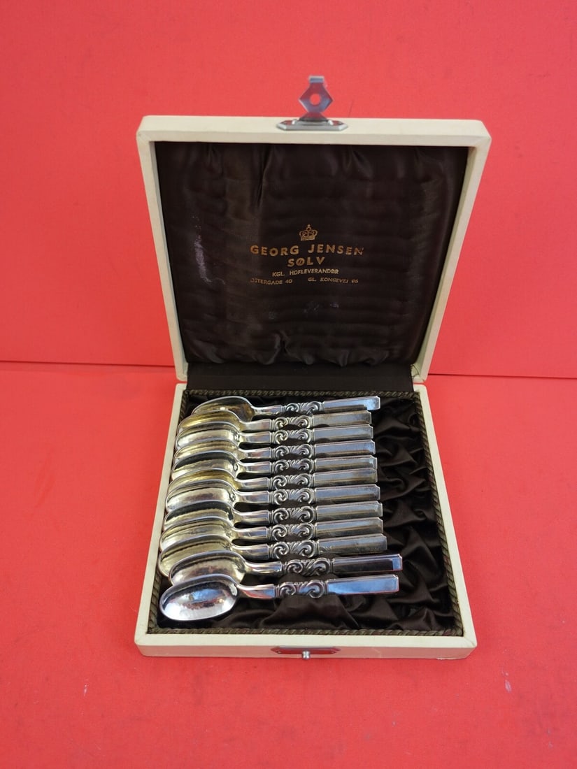 Georg Jensen Scroll Sterling Silver Mocha Spoon Set of 12 in Fitted Box: Georg Jensen Scroll Sterling Silver Mocha Spoon Set of 12 in Fitted Box This exquisite set of 12 mocha spoons is crafted from high-quality sterling silver and features the elegant Scroll pattern by Ge