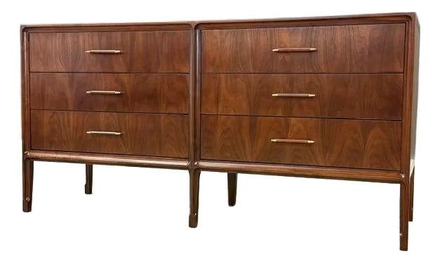 Mid Century Walnut Dresser 1960s United Furniture 62" Wide: Mid Century Walnut Dresser 1960s United Furniture 62" Wide Experience the timeless elegance of this mid-century modern dresser, expertly refinished for a fresh look. Crafted from rich walnut, this dre