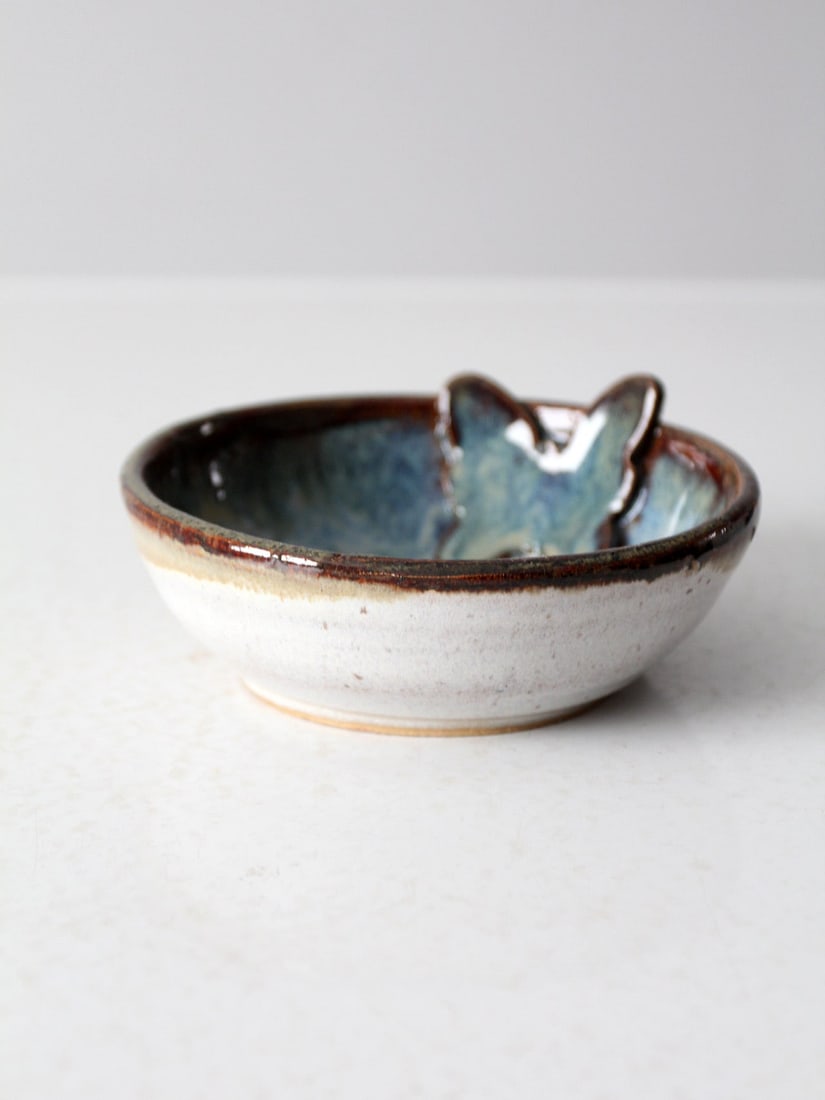 Signed Vintage Studio Pottery Butterfly Bowl Iridescent Blue Glaze: Signed Vintage Studio Pottery Butterfly Bowl Iridescent Blue Glaze This vintage studio pottery bowl showcases a stunning iridescent butterfly peeking out from the blue glazed interior, complemented by