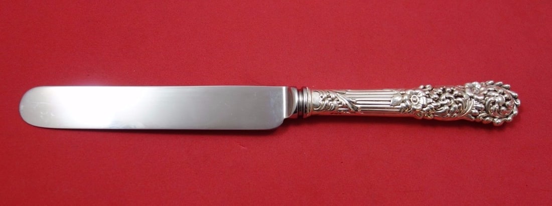 Reed & Barton Trajan Sterling Silver Knife Blunt Blade 8 3/4": Reed & Barton Trajan Sterling Silver Knife Blunt Blade 8 3/4" This exquisite knife from the Trajan pattern by Reed & Barton showcases a classic design with a hollow handle made of sterling silver and