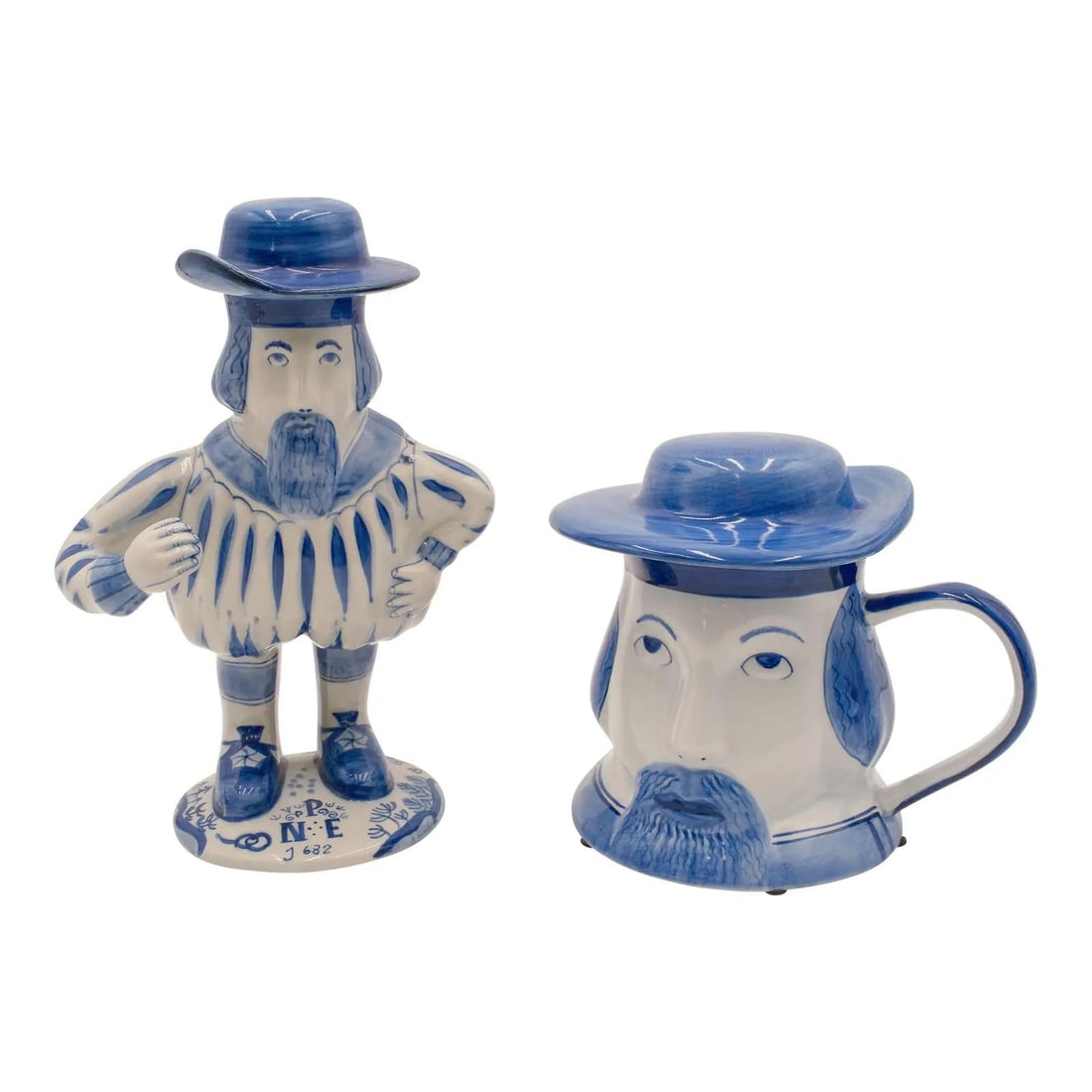 Royal Delft Colonial Williamsburg Mr. Nobody Ceramic Mug and Decanter Pair: Royal Delft Colonial Williamsburg Mr. Nobody Ceramic Mug and Decanter Pair This charming pair of Royal Delft Colonial Williamsburg "Mr. Nobody" ceramic items, consisting of a mug and a decanter, showc
