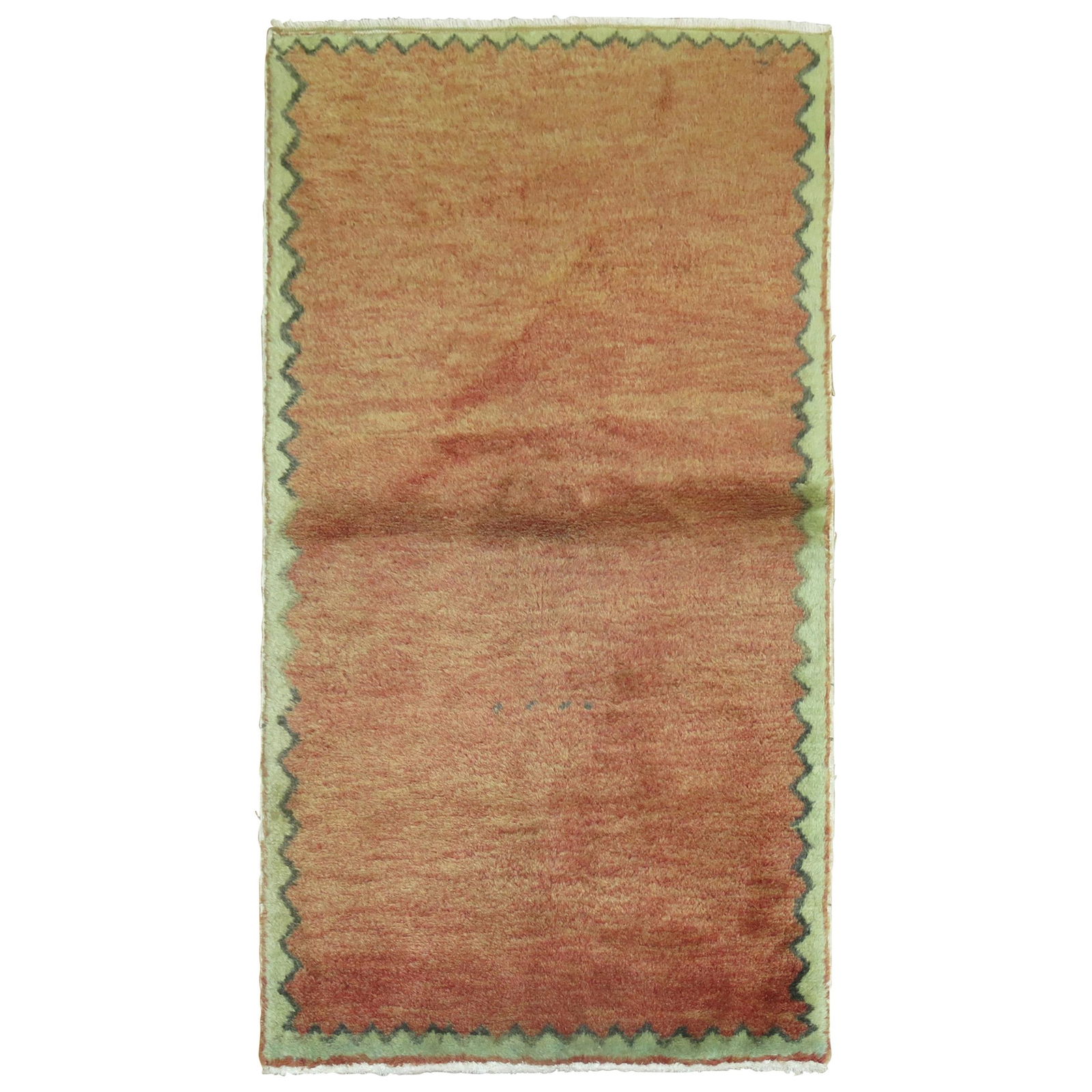 Unique Brick Red Hand-Woven Turkish Modernist Carpet 30 x 50: Unique Brick Red Hand-Woven Turkish Modernist Carpet 30 x 50 This unique mid-20th century Turkish modernist carpet showcases a stunning brick red color complemented by a soft green border. Hand-woven