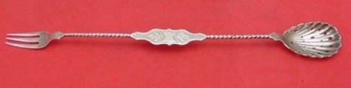 Coin Silver Brite-Cut Twisted Pickle Fork Olive Spoon 11": Coin Silver Brite-Cut Twisted Pickle Fork Olive Spoon 11" This exquisite pickle fork and olive spoon combination features a bright-cut twisted design, crafted from coin silver. Dating back to the late