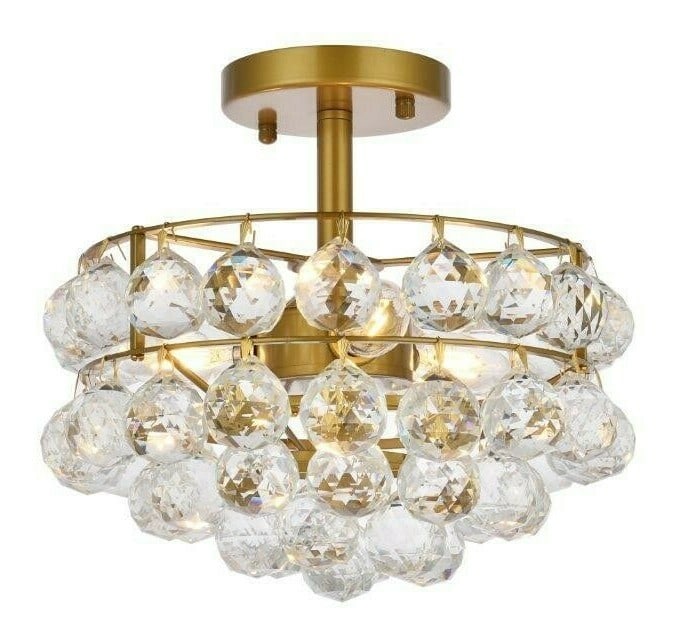 Savannah 3-Light Brass Crystal Semi Flush Mount Chandelier 12 inch: Savannah 3-Light Brass Crystal Semi Flush Mount Chandelier 12 inch Illuminate your space with this elegant semi-flush mount chandelier, featuring a modern design with a brass color frame and clear roy