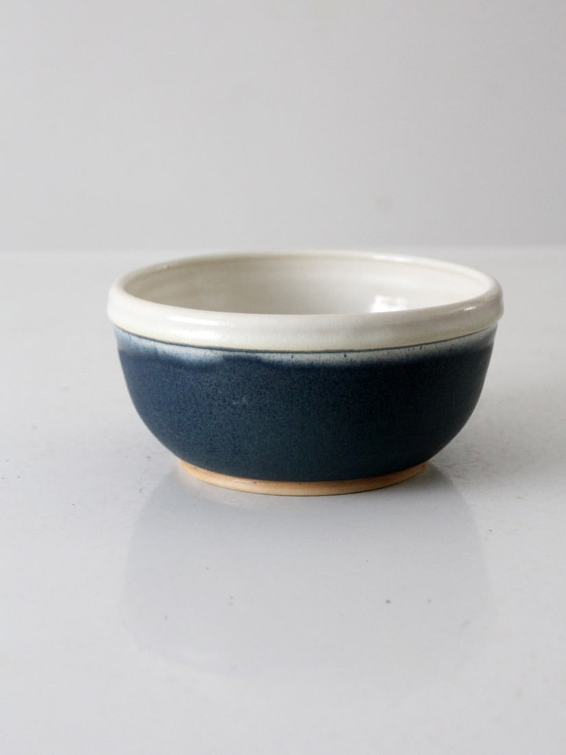 Handmade Vintage Studio Pottery Bowl Signed Blue and White Glaze 6.375in: Handmade Vintage Studio Pottery Bowl Signed Blue and White Glaze 6.375in This vintage studio pottery bowl showcases a beautiful handmade design with a rich blue and creamy white glaze. Signed by the a