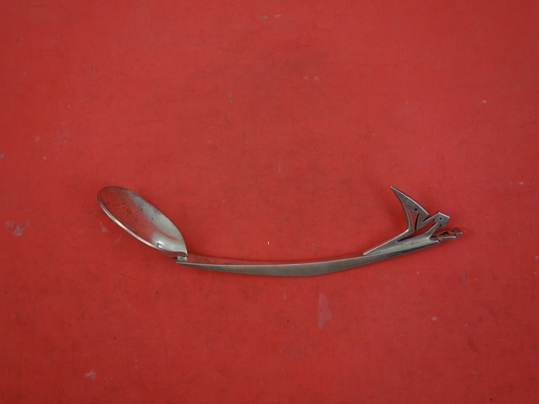 Indigenous Hand Wrought Sterling Silver Spoon with Parrot 7.25 inches: Indigenous Hand Wrought Sterling Silver Spoon with Parrot 7.25 inches This exquisite Indigenous Sterling Silver Sugar Spoon is a beautiful example of hand-wrought artistry, featuring an applied pierce