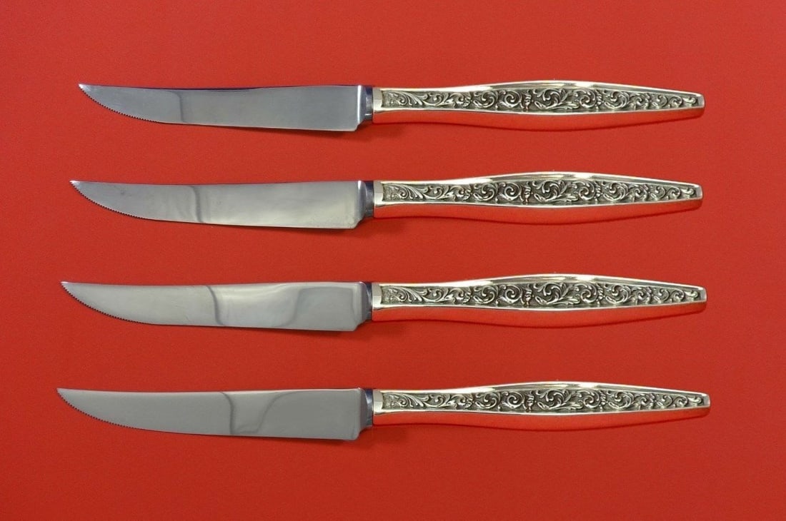 Reed & Barton Renaissance Scroll Sterling Silver Steak Knife Set 4pc: Reed & Barton Renaissance Scroll Sterling Silver Steak Knife Set 4pc Enhance your dining experience with this exquisite 4-piece steak knife set from Reed & Barton, crafted in luxurious sterling silver