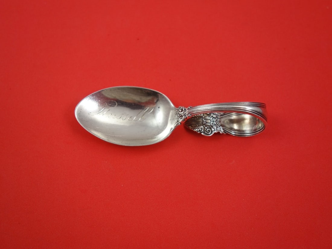 International Sterling Silver Jeanne D'Arc Baby Spoon Monogrammed Russell 3.5" Bent Handle: International Sterling Silver Jeanne D'Arc Baby Spoon Monogrammed Russell 3.5" Bent Handle This exquisite baby spoon features the Jeanne D'Arc pattern by International Sterling. Crafted from high-qual