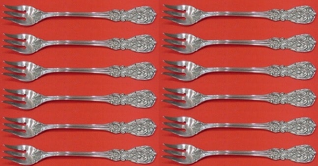 Reed & Barton Francis I Sterling Silver Cocktail Forks Set of 12: Reed & Barton Francis I Sterling Silver Cocktail Forks Set of 12 This exquisite set of 12 cocktail forks is crafted in sterling silver, featuring the elegant Francis I pattern by Reed & Barton. Each f