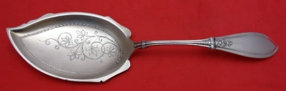 Whiting Italian Sterling Silver Ice Cream Server Brite-Cut 9 3/4": Whiting Italian Sterling Silver Ice Cream Server Brite-Cut 9 3/4" This exquisite ice cream server features the elegant 'Italian' pattern by Whiting, crafted from high-quality sterling silver. Measurin