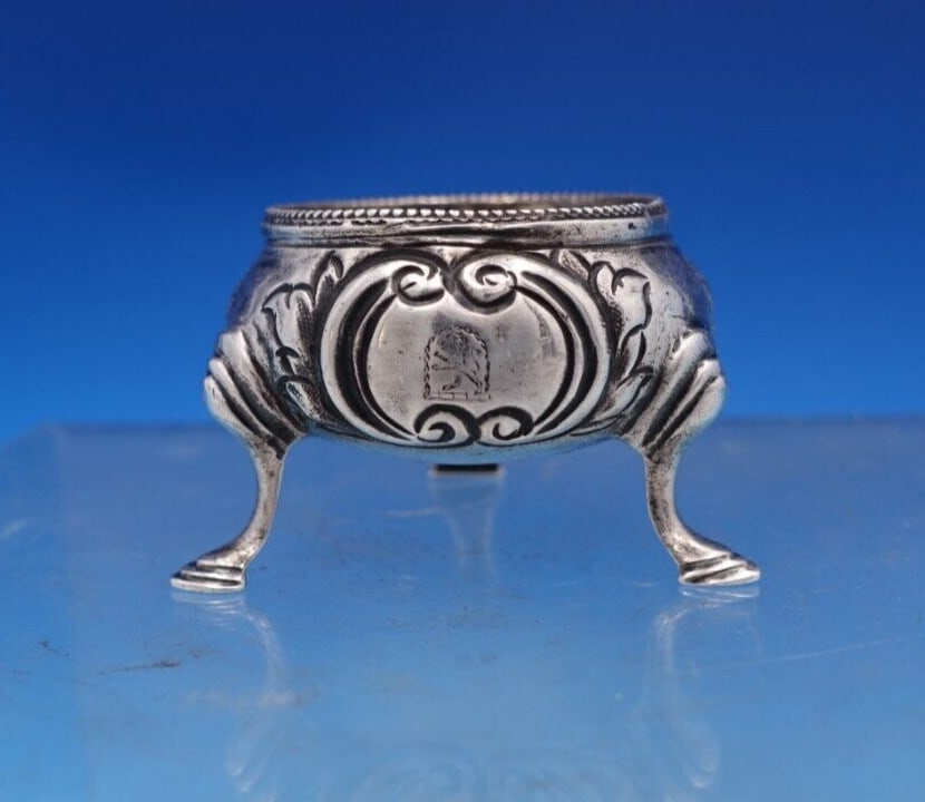 Victorian Sterling Silver Salt Cellar by Charles Boyton with Lion Design: Victorian Sterling Silver Salt Cellar by Charles Boyton with Lion Design This exquisite Victorian salt cellar, crafted by Charles Boyton in London circa 1845, showcases stunning repousse flowers and a