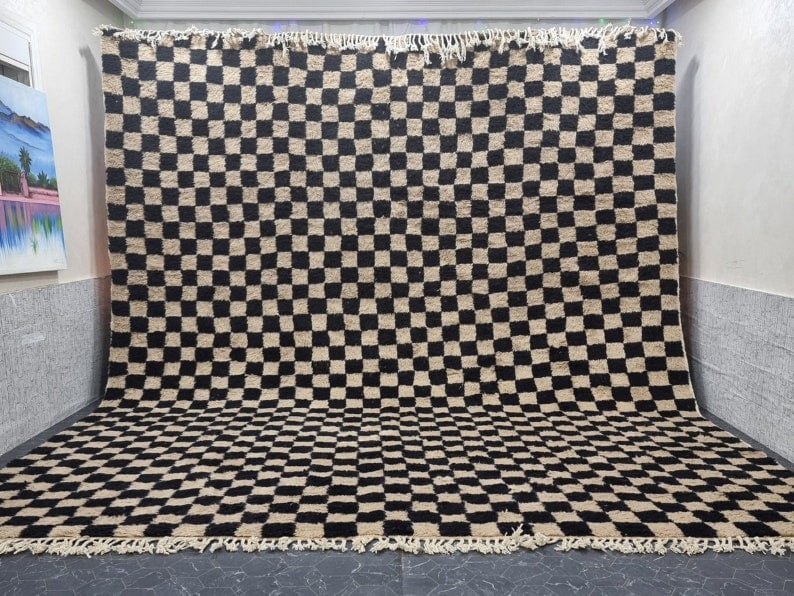 Handwoven Large White and Black Rug 100% Wool from Morocco: Handwoven Large White and Black Rug 100% Wool from Morocco Transform your space with this large, authentic white and black rug, handwoven in the Atlas Mountains by local Berber women weavers. Crafted