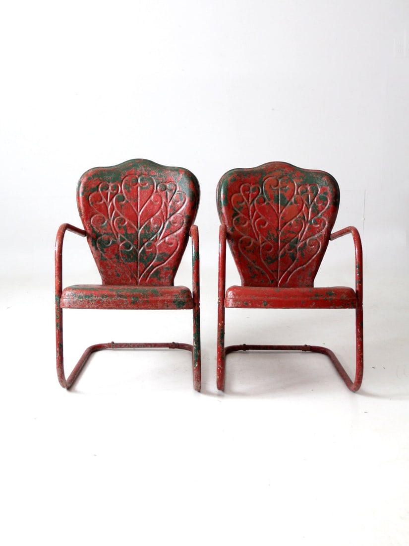 Vintage Mid Century Steel Bouncer Lounge Chairs Pair with Heart Design: Vintage Mid Century Steel Bouncer Lounge Chairs Pair with Heart Design Experience the charm of mid 20th century design with this pair of vintage patio lounge chairs. Crafted from steel, these art deco
