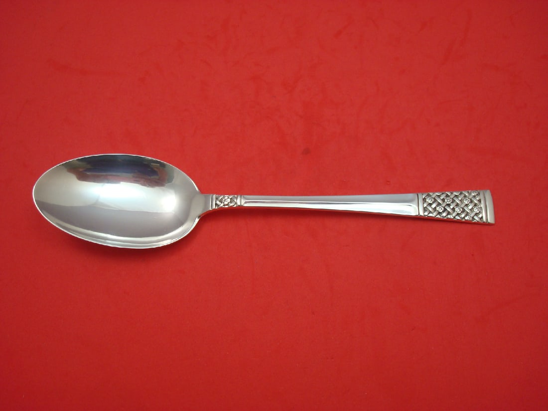 Lunt Columbine Sterling Silver Serving Spoon 8 3/8 Inch: Lunt Columbine Sterling Silver Serving Spoon 8 3/8 Inch This exquisite serving spoon is crafted from sterling silver and features the elegant Columbine pattern by Lunt. Measuring 8 3/8 inches in lengt