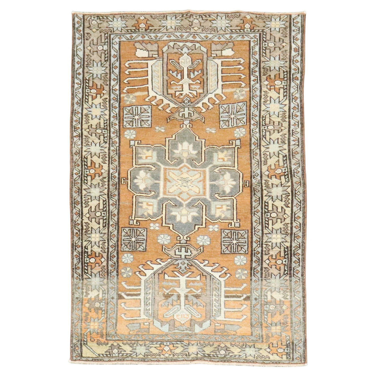 Early 20th Century Persian Heriz Wool Throw Rug 33 x 52 Inches: Early 20th Century Persian Heriz Wool Throw Rug 33 x 52 Inches This is a small Persian antique Heriz throw rug from the early 20th century. It features a rustic style and is hand-woven from wool. Orig