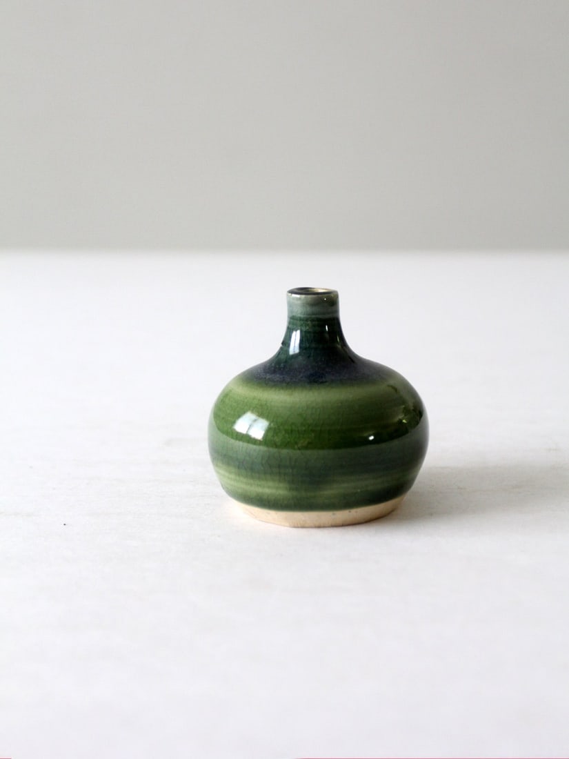 Signed Vintage Studio Pottery Vase Green Ombre Handmade 3": Signed Vintage Studio Pottery Vase Green Ombre Handmade 3" Discover this exquisite vintage studio pottery vase, a true testament to artisanal craftsmanship. This handmade bottleneck vase showcases a s